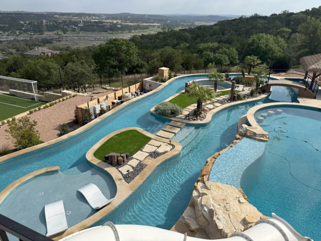 Swimming pool with fire pit, tile and coping done by Blessing Pools