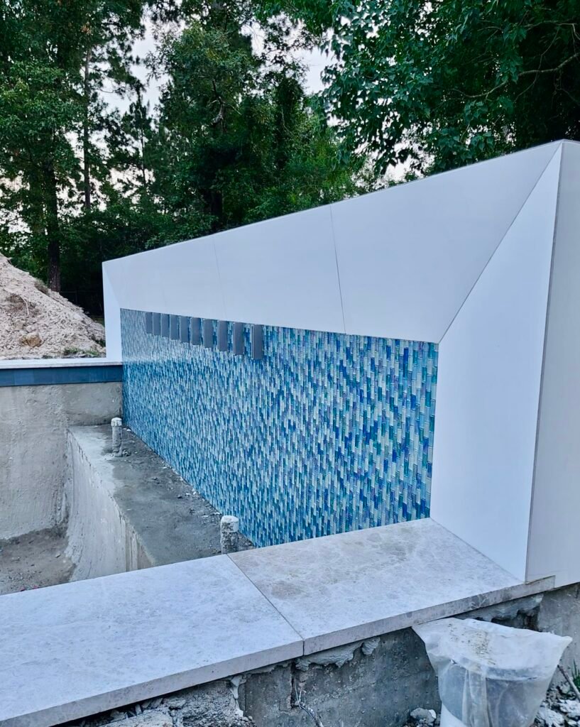 Swimming Pool wall with Scuppers; Waterfall; Tile and Coping; Blessing Pools